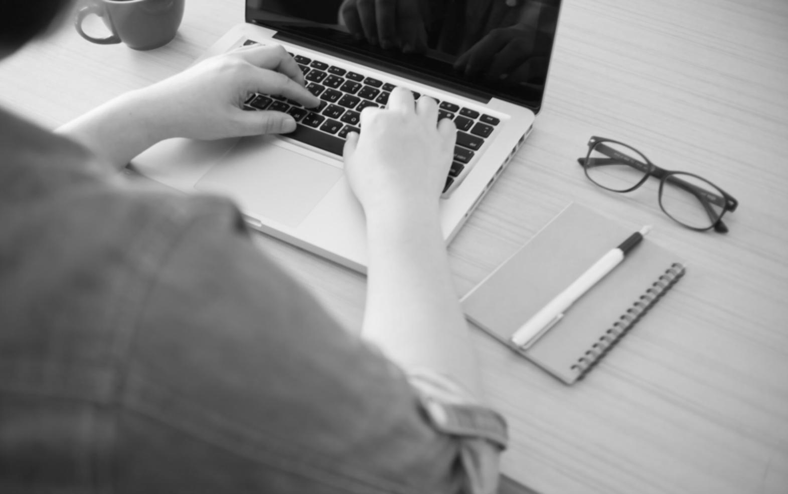 Modern office environment with financial reporting tools and technology setup