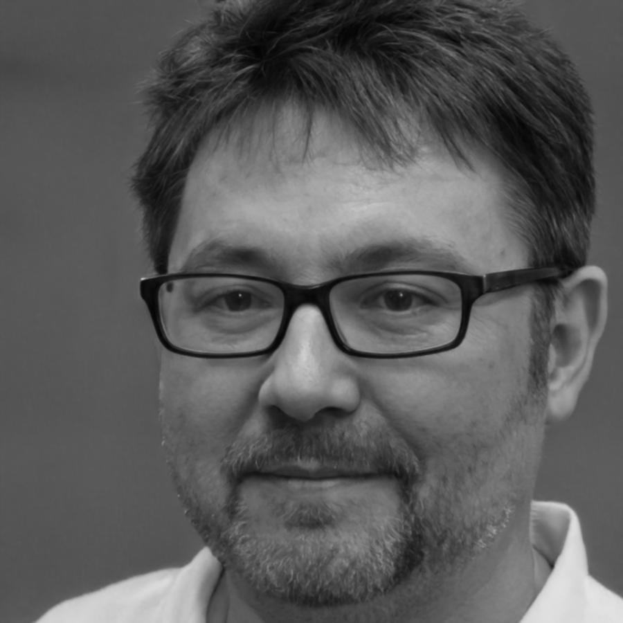 Financial advisor reviewing investment reports